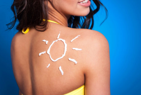 suntan lotion woman s arm sun shape Freepik