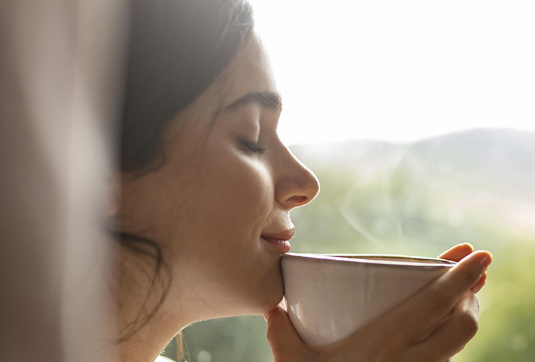 close up woman ndrinking coffee Image by from Freepik